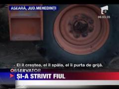 Copil strivit de combina tatalui