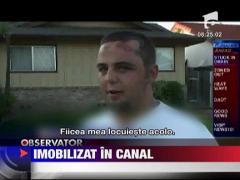 Un tanar din SUA a stat aproape o ora intepenit intr-un canal