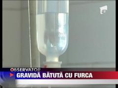 Gravida batuta cu furca de propriul sot