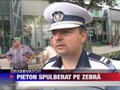 Pieton spulberat pe zebra