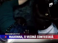 Madonna data in judecata de o vecina