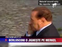 Berlusconi o jigneste fara jena pe Angela Merkel