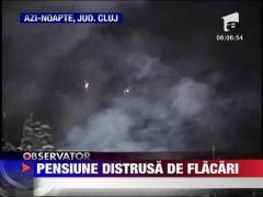 Pensiune distrusa de flacari