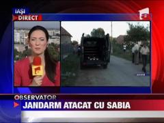 Jandarm atacat cu sabia in fata blocului, in Pascani