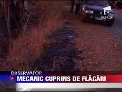 Mecanic amenintat de flacari
