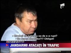 Jandarmi atacati cu sabii in trafic