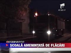 Scoala amenintata de flacari