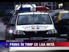 Politist cumparat cu 200 de lei
