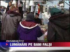 Bani falsi printre enoriasi