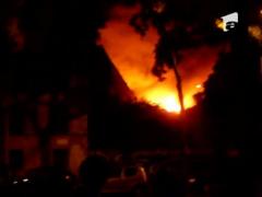 Depozit in flacari la Paris: Zeci de imigranti romani, salvati