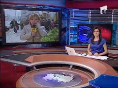 O femeie a lesinat la coada pentru ajutoare