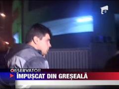 Tanar impuscat din greseala