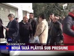 Noua taxa din Grecia platita sub presiune