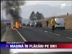 Masina in flacari pe DN1