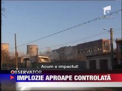 Implozia unui turn a facut praf geamurile din zona