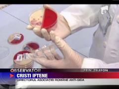 O barmanita, concediata pentru ca este infectata cu HIV