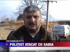 Politist atacat cu sabia