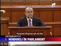 Premierul Emil Boc, huiduit in plenul Parlamentului