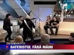 Trupa Scorpions, acompaniata de un baterist fara maini