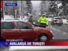 Avalansa de turisti la munte