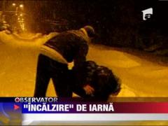 Ametit de aburii alcoolului, un politist face tumbe prin zapada!