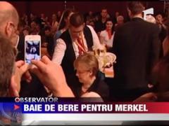 Baie de bere pentru Angela Merkel