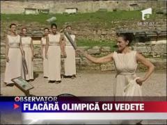 Flacara olimpica de la Londra, purtata si de Kylie Minogue, Will Smith si Jackie Chan