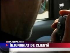 Taximetrist injunghiat de o clienta