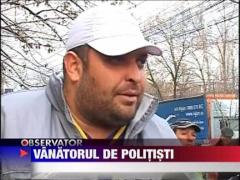 Un politist a fost impuscat in cap