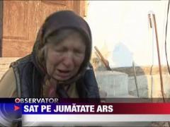 Sat pe jumatate ars din cauza neatentiei locuitorilor