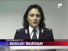 Cu bicicleta in masina politiei