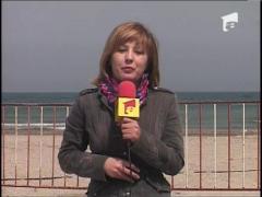 Lumina sfanta la malul marii