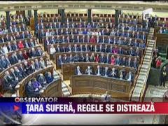 Spania sufera, regele se distreaza