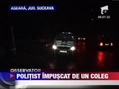Politist impuscat de un coleg
