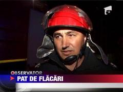 Pat cuprins de flacari
