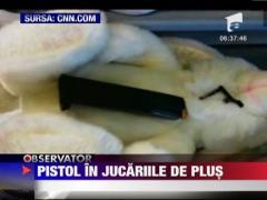 Pistol in jucariile de plus