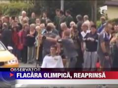 Flacara olimpica s-a stins accidental