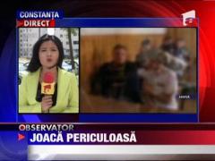 Joaca periculoasa in curtea scolii