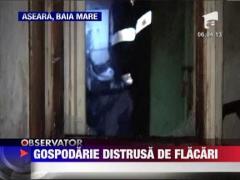 Gospodarie distrusa de flacari
