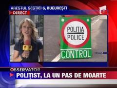 Un sofer a incercat sa calce cu masina un politist, in Bucuresti‎
