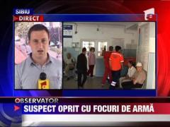 Suspect oprit cu focuri de arma