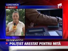 UPDATE / Politist retinut pentru mita