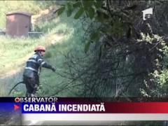 Cabana mistuita de flacari, in Resita