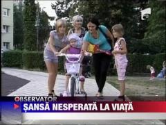 Fetita de 4 ani cu o tumora imensa la cap, sansa nesperata la viata