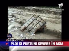 Ploile, furtunile si inundatiile fac ravagii in Asia