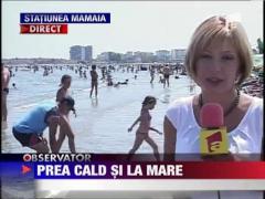 Razele soarelui "prajesc" turistii