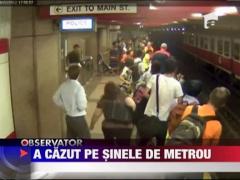 Imagini Socante! O mama care isi tinea copilul in brate a cazut pe sinele unui metrou din Boston