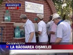 Topiti de soare si de sete, bucurestenii cauta racoarea cismelelor