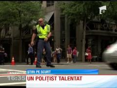 Un politist dirijeaza traficul in pas de dans