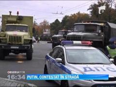 Vladimir Putin este, din nou, contestat in strada